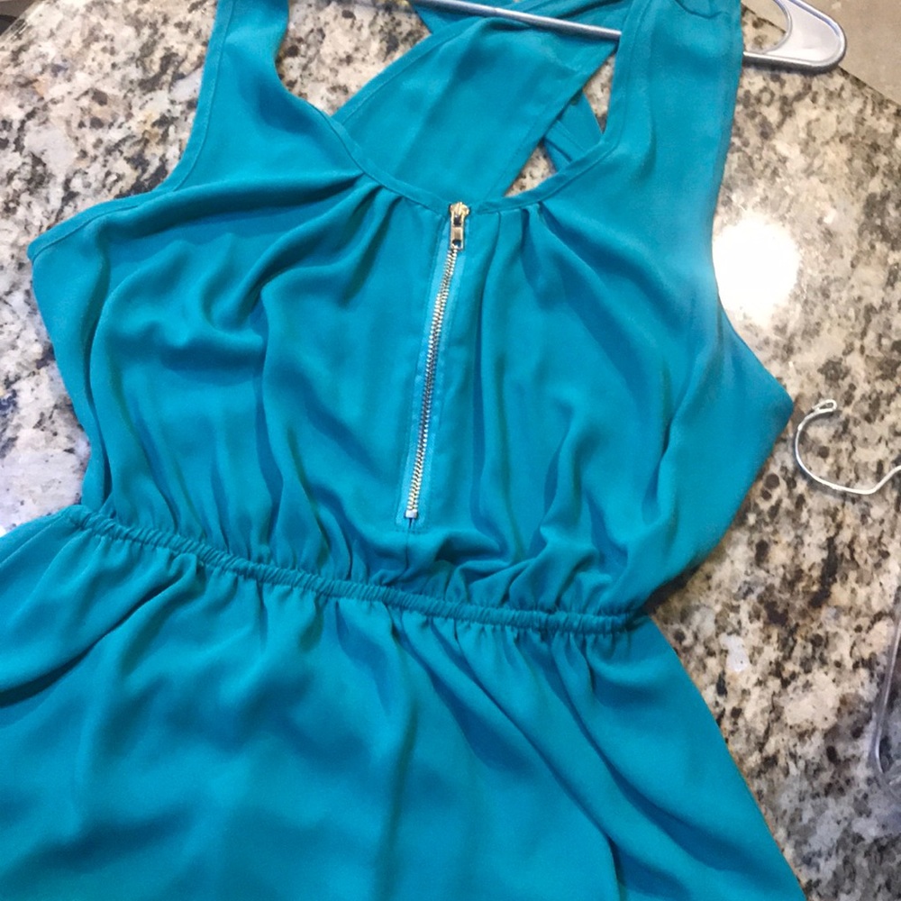 Super cute teal dress! Open back. Gold zipper